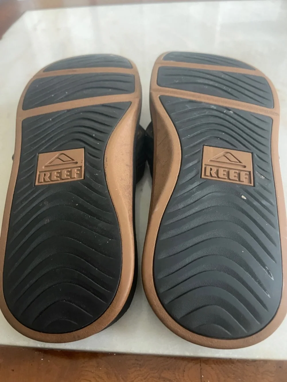 Reef Black Flip Sandals with Brown Accents